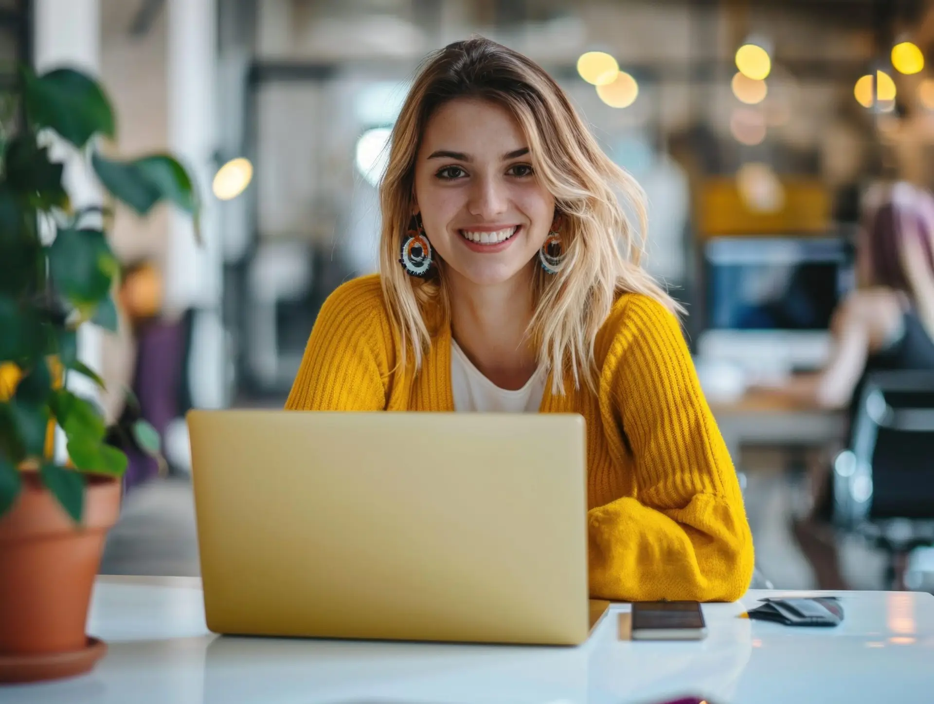 Woman using laptop in office