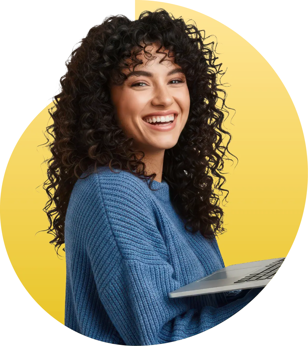 woman holding laptop smiling